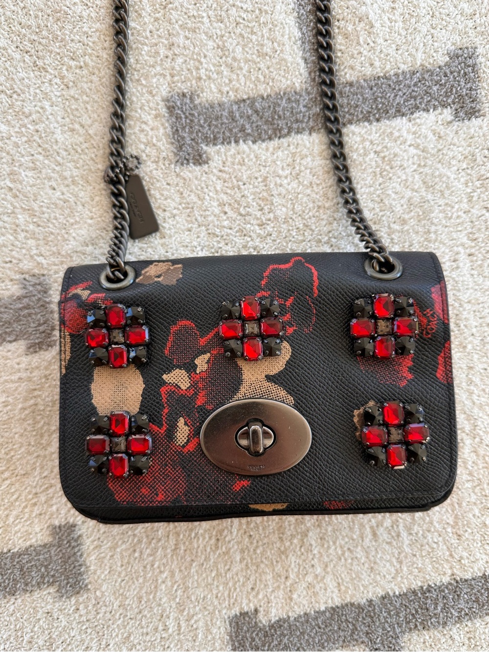 Coach Black Floral Mini Crossbody with Red Jewel Accents